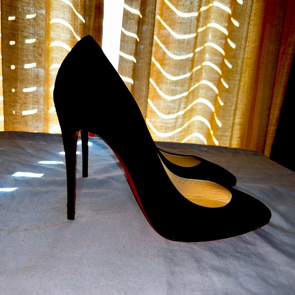 Christian Louboutin pointy toe pump